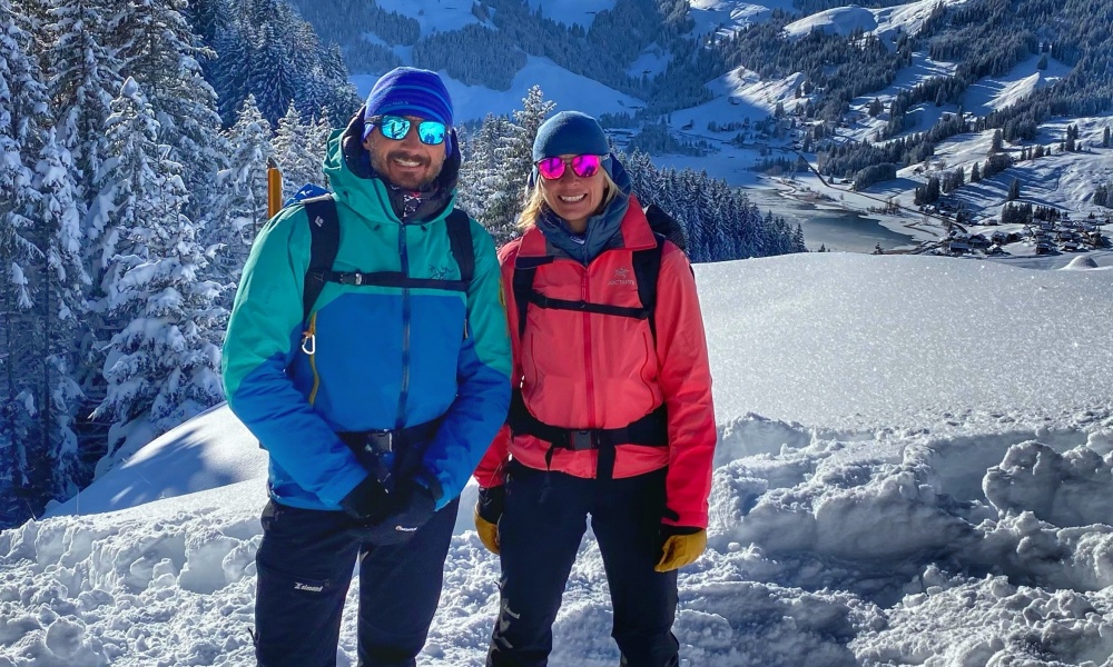 Gwen and Andy Bevan on a snowy slope in Switzerland
